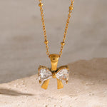 Load image into Gallery viewer, Stainless Steel Inlaid Zircon Bow Necklace

