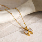 Load image into Gallery viewer, Stainless Steel Inlaid Zircon Bow Necklace
